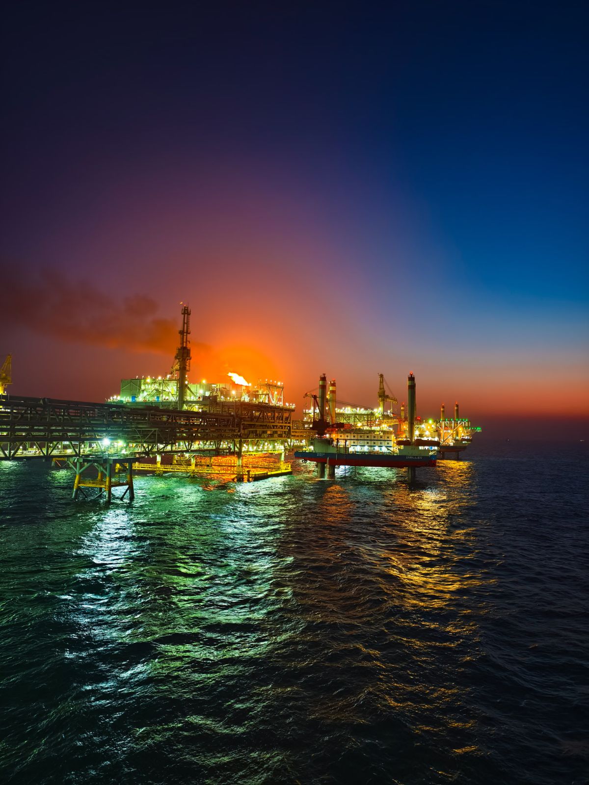 Illuminated offshore oil rig